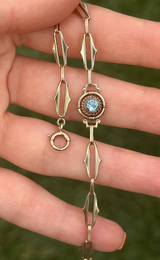 10ct Antique Stylized Trombone Chain with Aquamarine stone - 7.75”